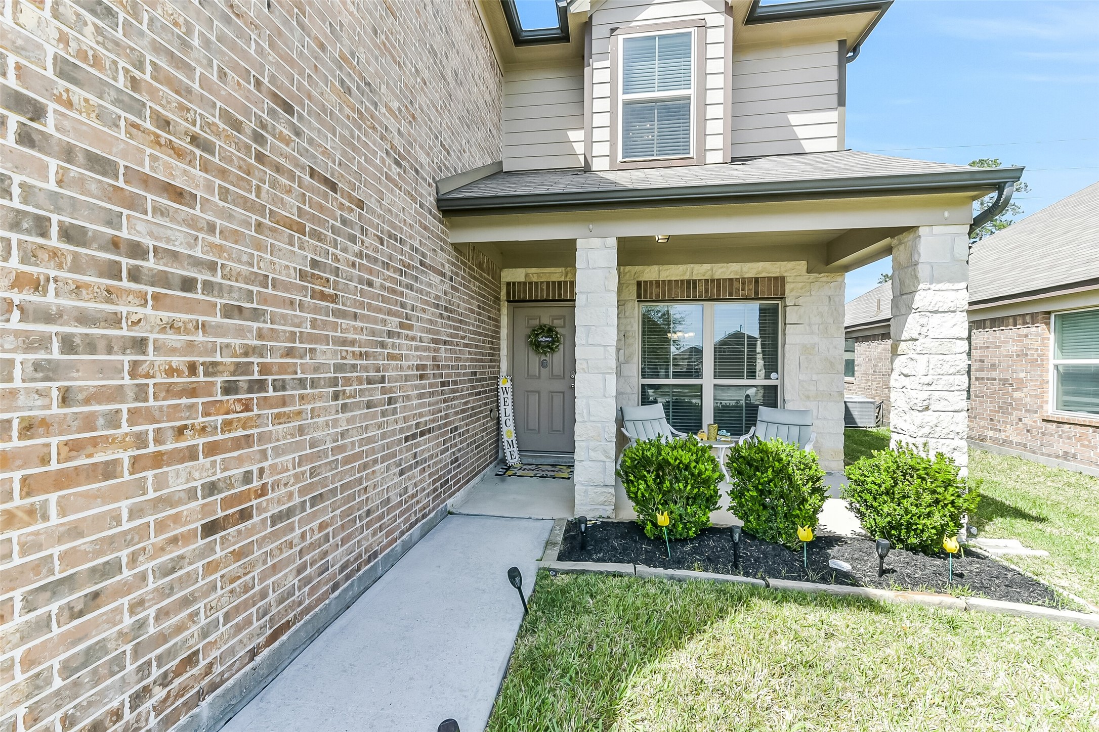 29418 Ridge Clearing Trail Spring, TX 77386 - Photo 3 of 37 front view of a brick house with a large window