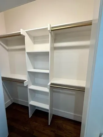 a bathroom with a sink toilet and vanity