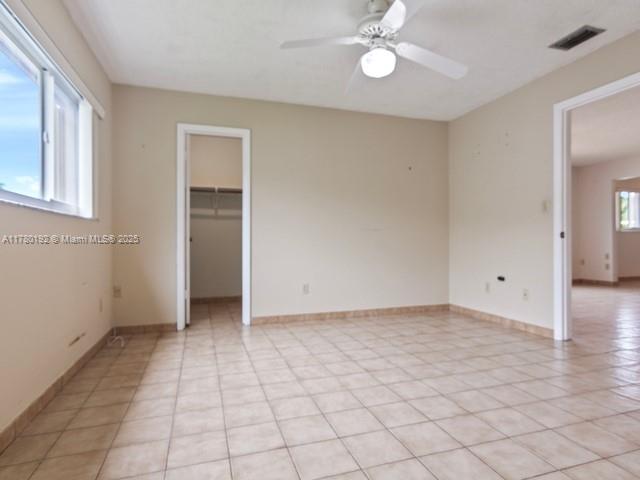 9864 Southwest 26th Terrace Miami, FL 33165 - Photo 25 of 39 a view of an empty room with a window