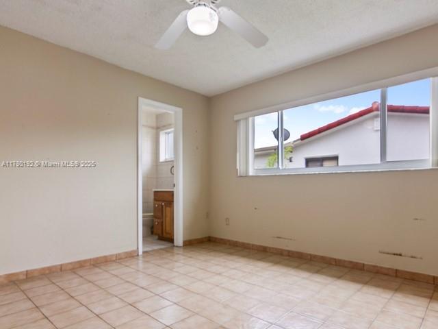 9864 Southwest 26th Terrace Miami, FL 33165 - Photo 27 of 39 a view of an empty room with window