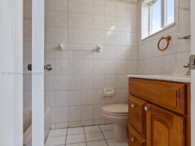 9864 Southwest 26th Terrace Miami, FL 33165 - Photo 28 of 39 a bathroom with a toilet and a shower