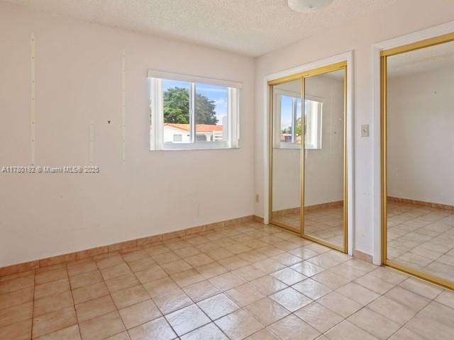 9864 Southwest 26th Terrace Miami, FL 33165 - Photo 31 of 39 a view of an empty room and window