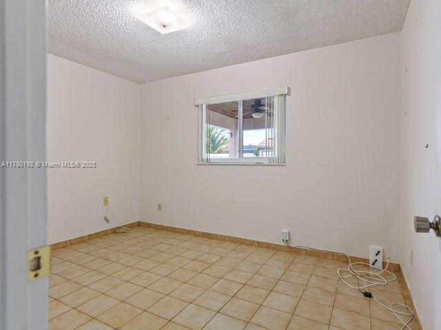9864 Southwest 26th Terrace Miami, FL 33165 - Photo 33 of 39 a view of a room with window