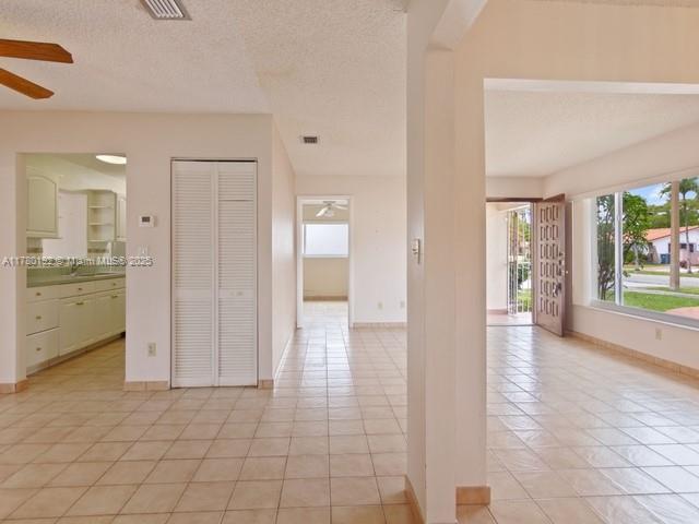 9864 Southwest 26th Terrace Miami, FL 33165 - Photo 8 of 39 a view of a hallway with bathroom and bathroom