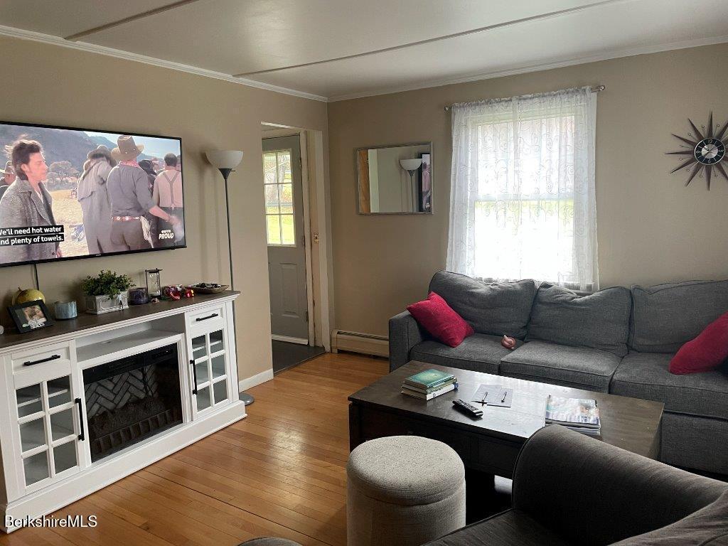 1320 Church Street North Adams, MA 01247 - Photo 13 of 33 a living room with furniture fireplace and window