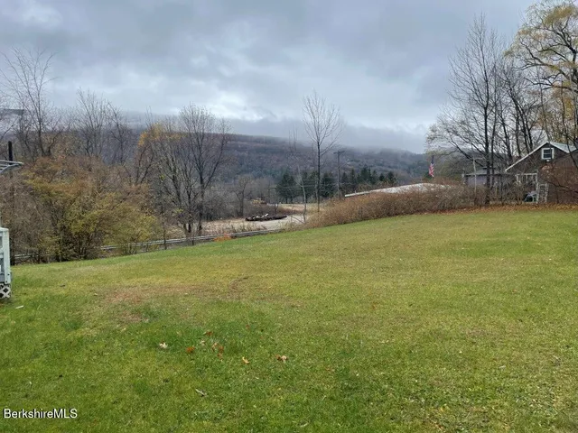 a view of outdoor space and yard