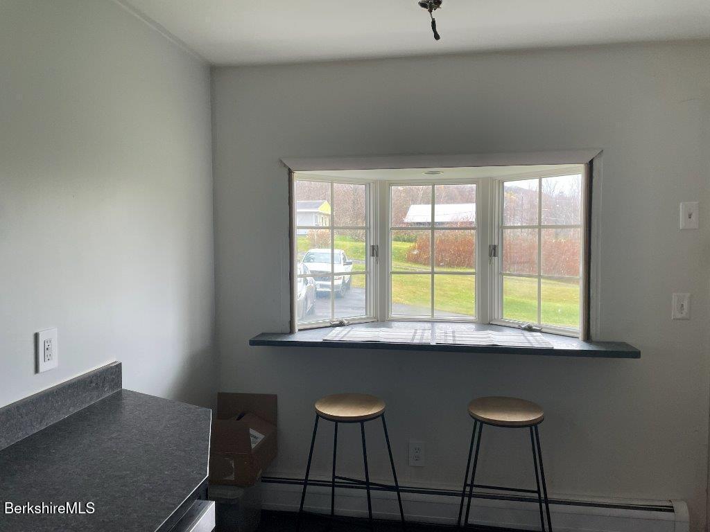 1320 Church Street North Adams, MA 01247 - Photo 7 of 33 a view of a workspace with furniture and window