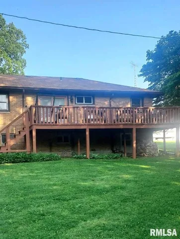 a view of a yard with a tree
