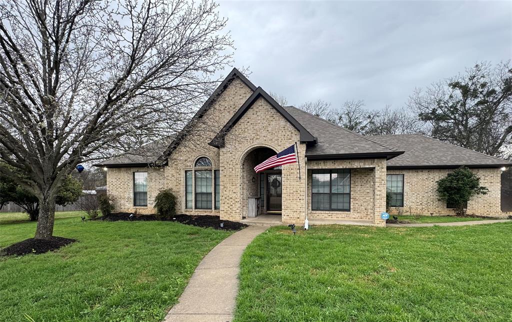 511 Emma Lane Grandview, TX 76050 - Photo 1 of 1 front view of a house with a yard