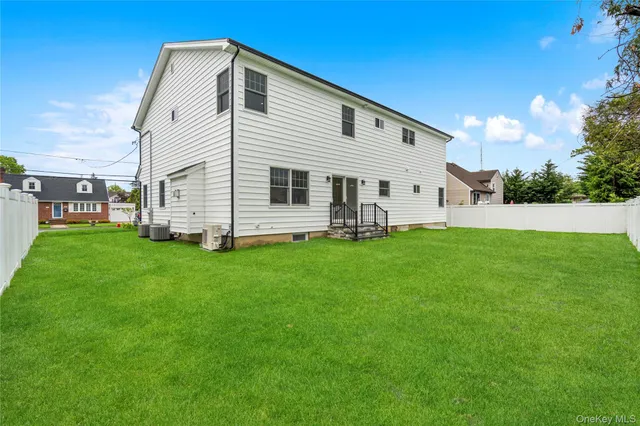 a front view of house with yard