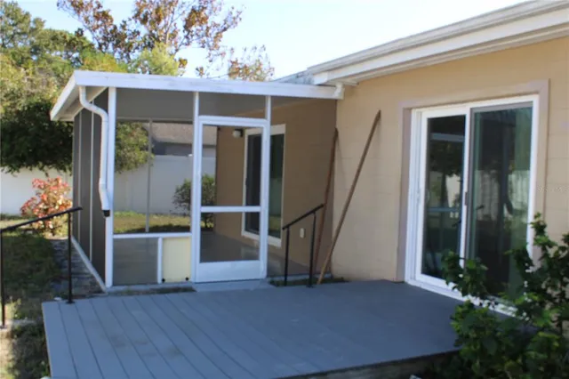 a view of a house with porch and wooden floor