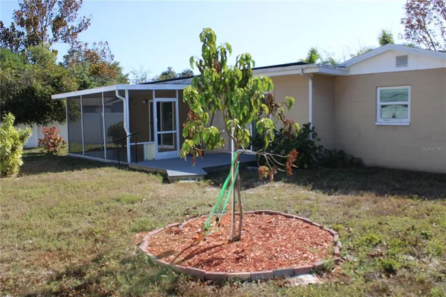 a house with yard in front of it