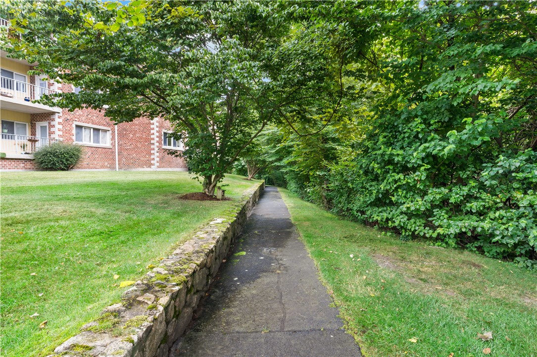 30 Argyle Avenue, Unit 201 Riverside, RI 02915 - Photo 37 of 37 walkway behind property
