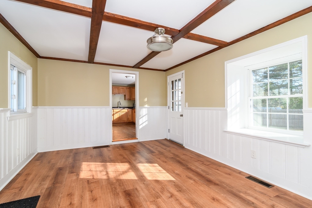 7 Ferndale Road Natick, MA 01760 - Photo 11 of 24 a view of empty room with wooden floor and windows