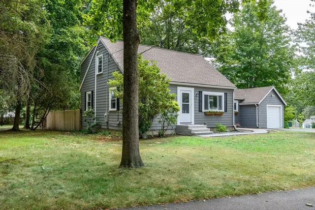a backyard of a house with seating space