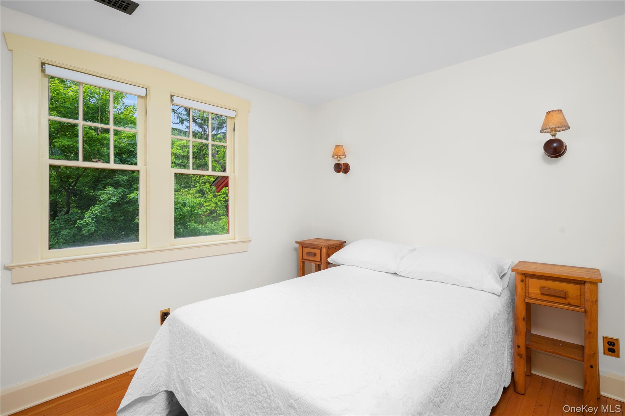 16 Locust Drive Cold Spring, NY 10516 - Photo 20 of 50 a bedroom with a bed and a window