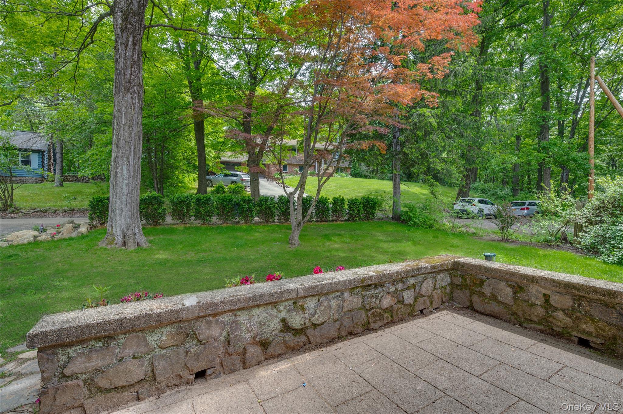 16 Locust Drive Cold Spring, NY 10516 - Photo 4 of 50 a view of a garden with a bench