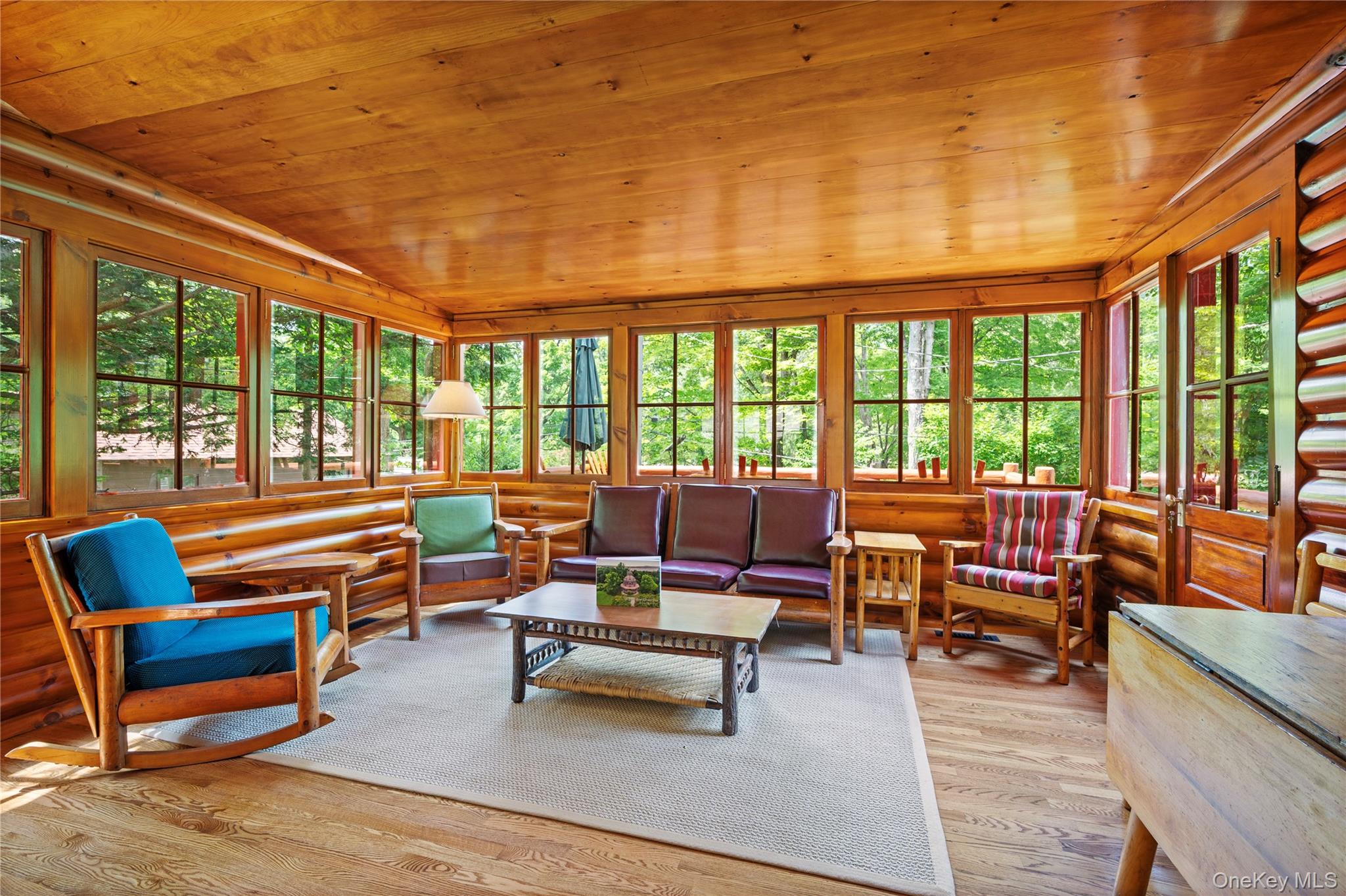 16 Locust Drive Cold Spring, NY 10516 - Photo 10 of 50 a living room with furniture and floor to ceiling windows
