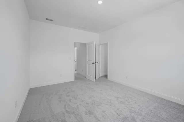 a bathroom with a shower and a toilet