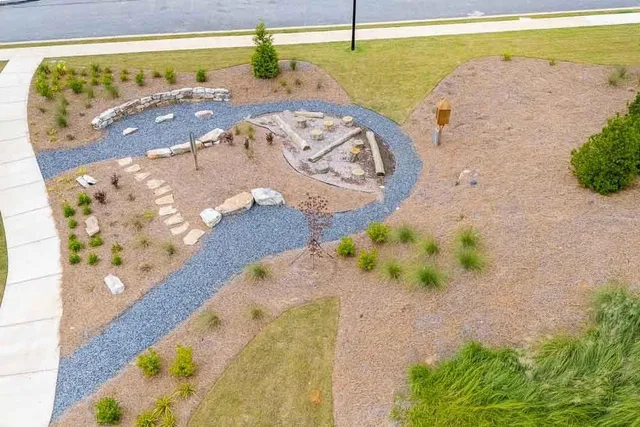 a view of a yard with an outdoor space