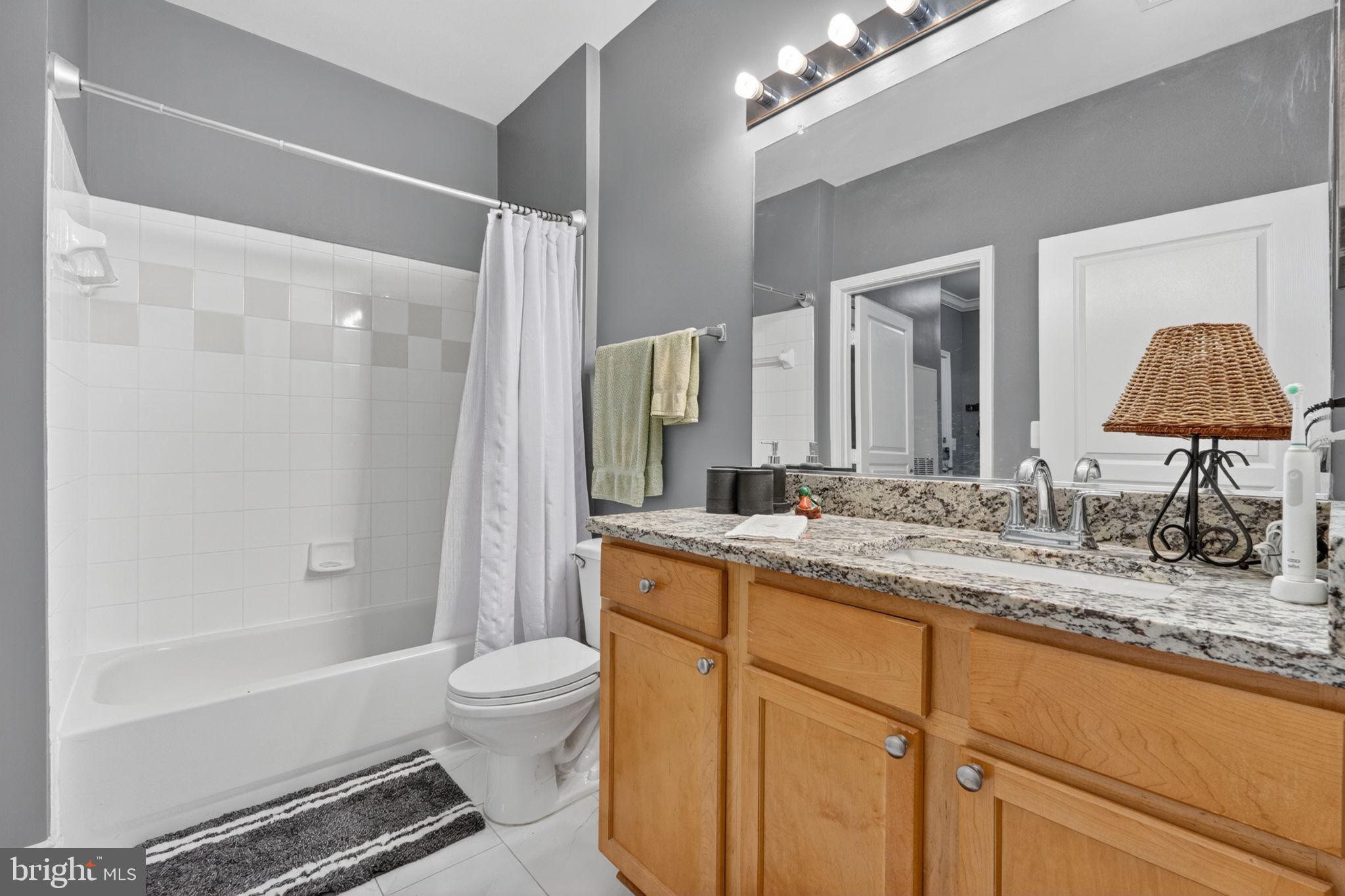 12000 Market Street, Unit 266 Reston, VA 20190 - Photo 17 of 49 Updated bathroom