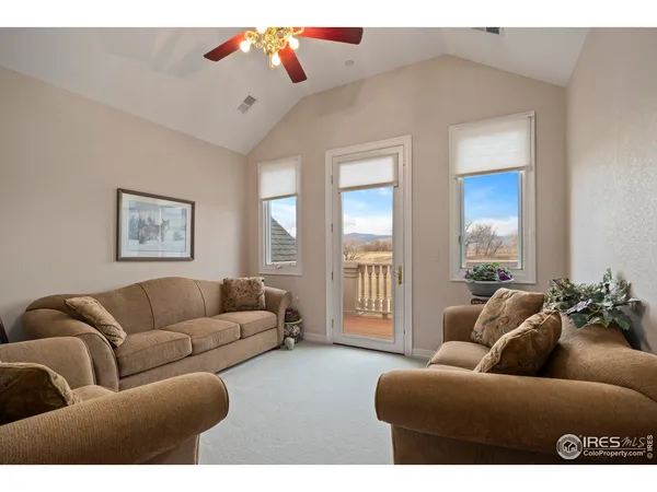 a bathroom with a toilet a sink and a mirror