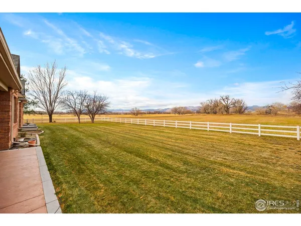 front view of a house with a big yard