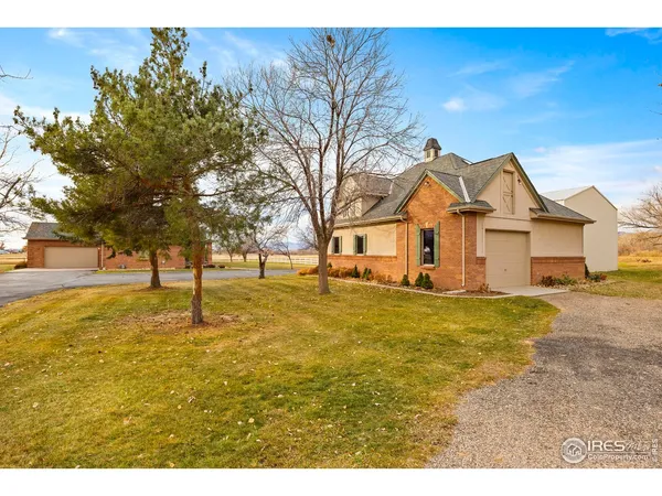 a view of a house with a big yard
