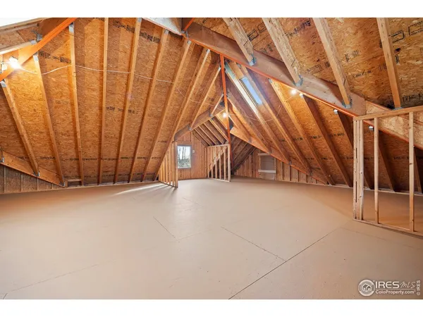 a view of a garage with an outdoor space