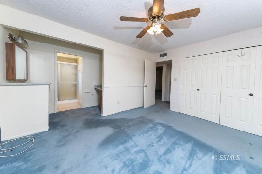 736 Sherri Street Ridgecrest, CA 93555 - Photo 11 of 42 a view of empty room with ceiling fan