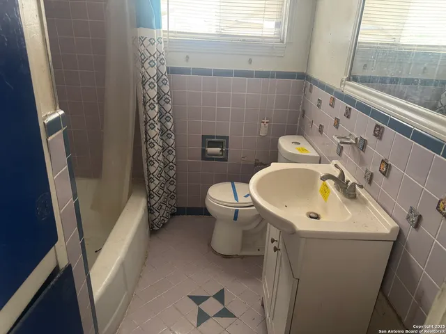 a kitchen with a stove and a cabinet