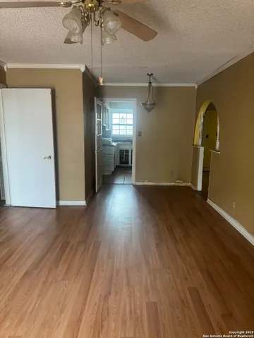 a kitchen with a stove top oven sink and cabinets