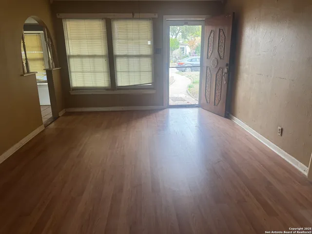 an empty room with windows