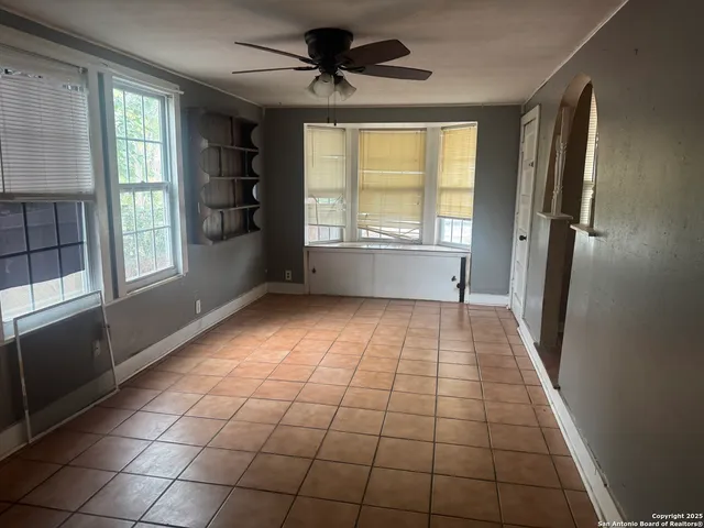 a view of street with parked cars
