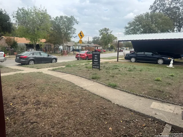a view of a street with cars
