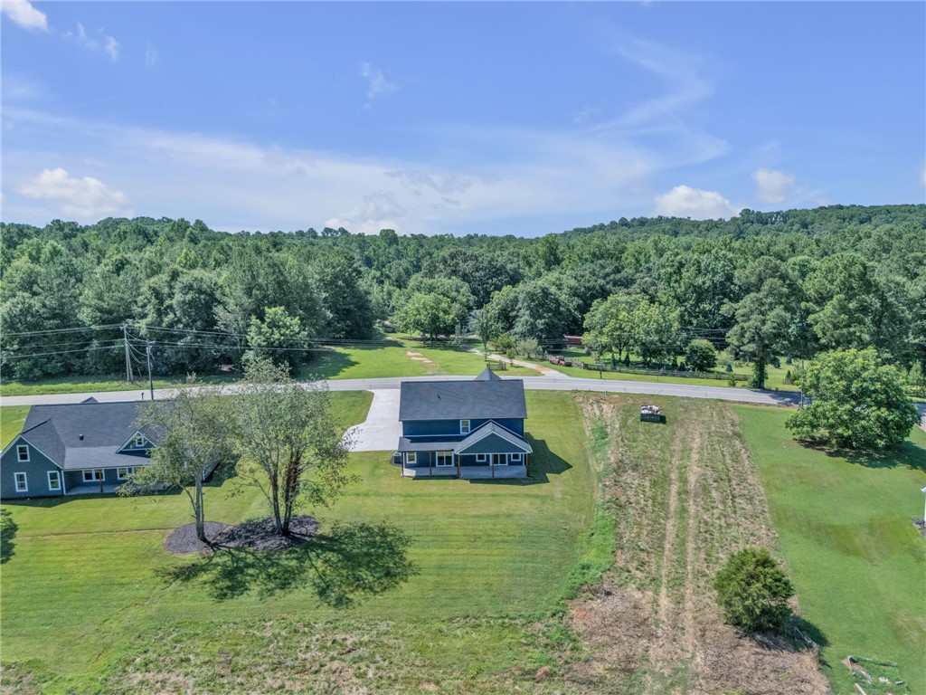 1723 Harris Bridge Road Anderson, SC 29621 - Photo 28 of 33 Perched on a verdant lot, this charming residence offers a peaceful countryside retreat.