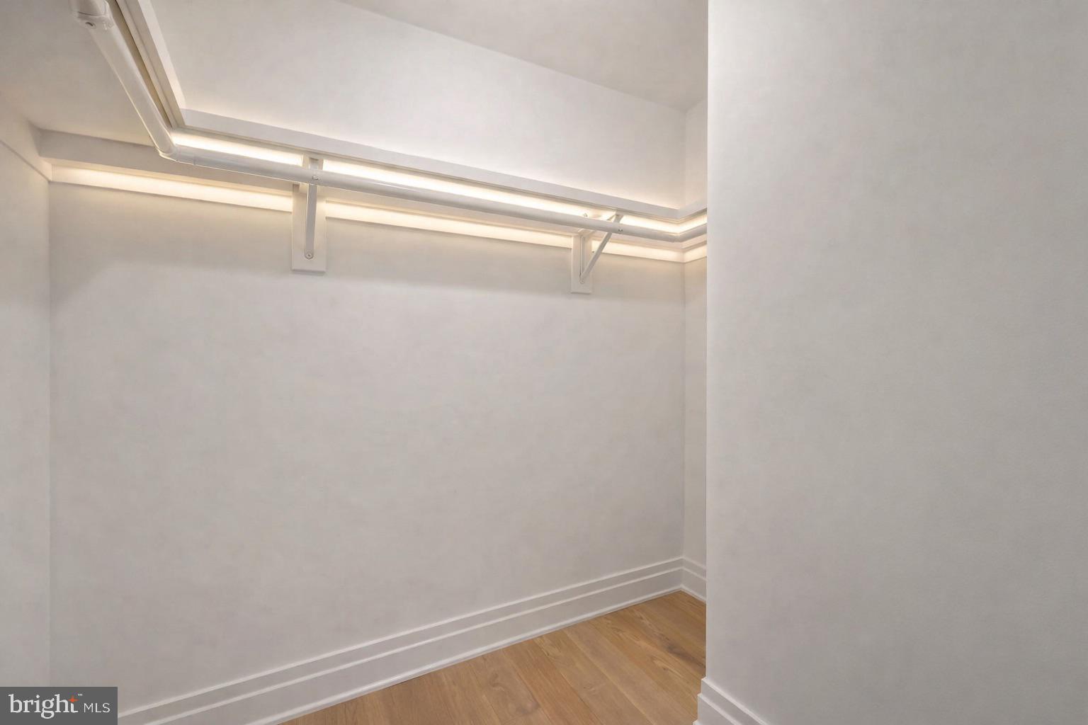 2501 M Street Northwest, Unit 209 Washington, DC 20037 - Photo 24 of 48 a view of a room with racks on the wall