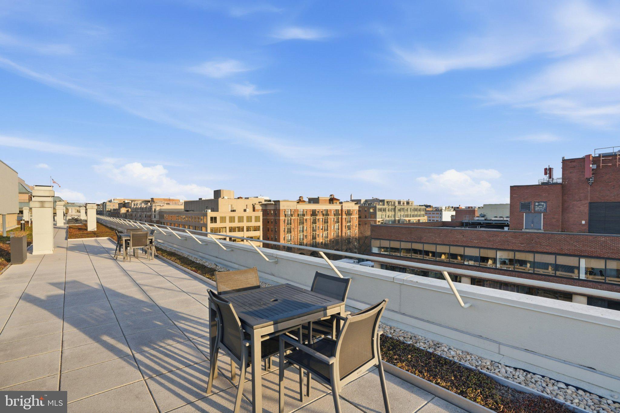2501 M Street Northwest, Unit 209 Washington, DC 20037 - Photo 36 of 48 a view of a terrace with chairs