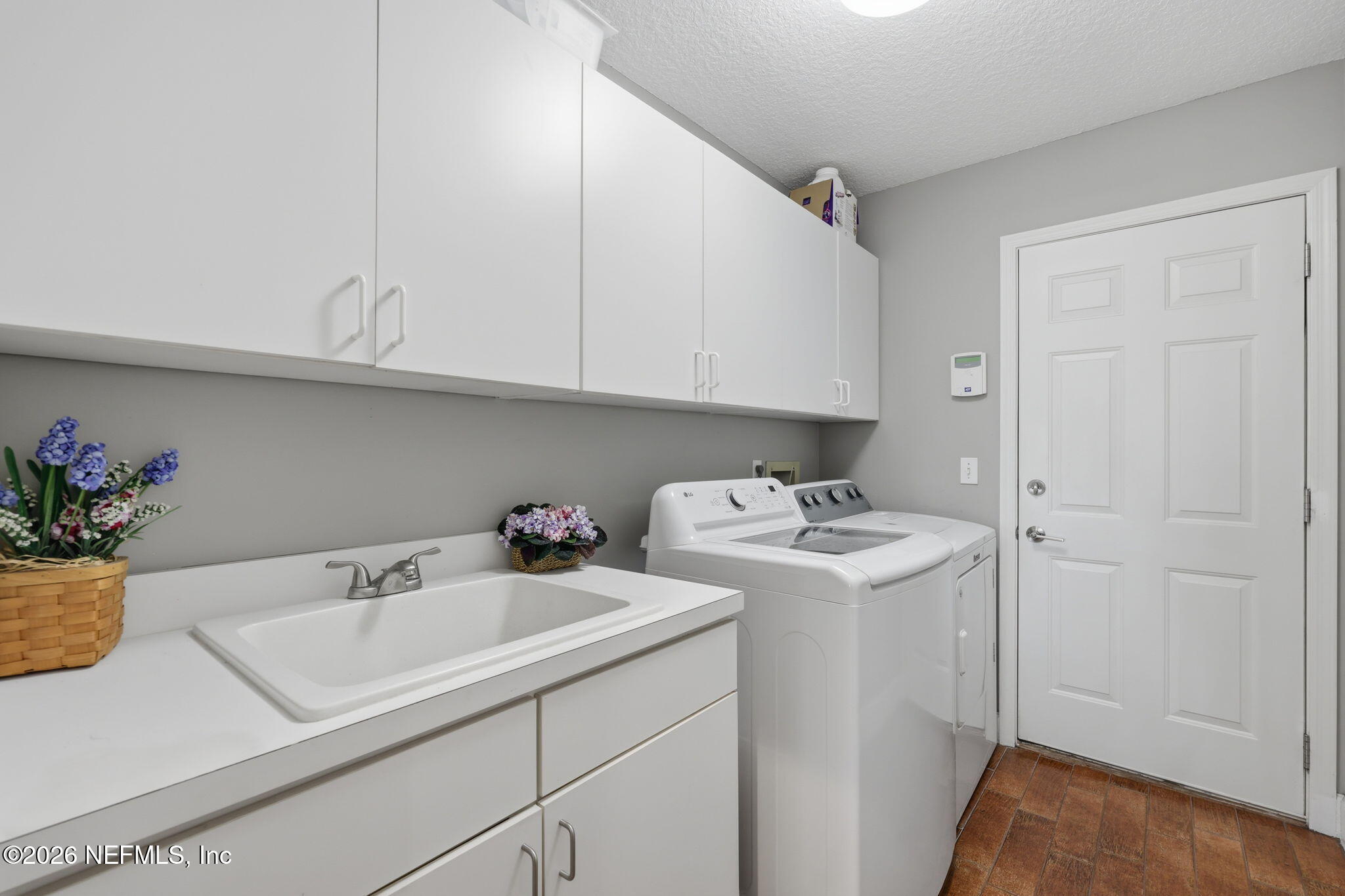 12829 Biggin Church Road South Jacksonville, FL 32224 - Photo 30 of 45 Downstairs Inside Laundry