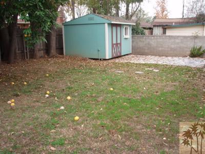 4258 Highland Place Riverside, CA 92506 - Photo 6 of 6 a view of a house with a yard