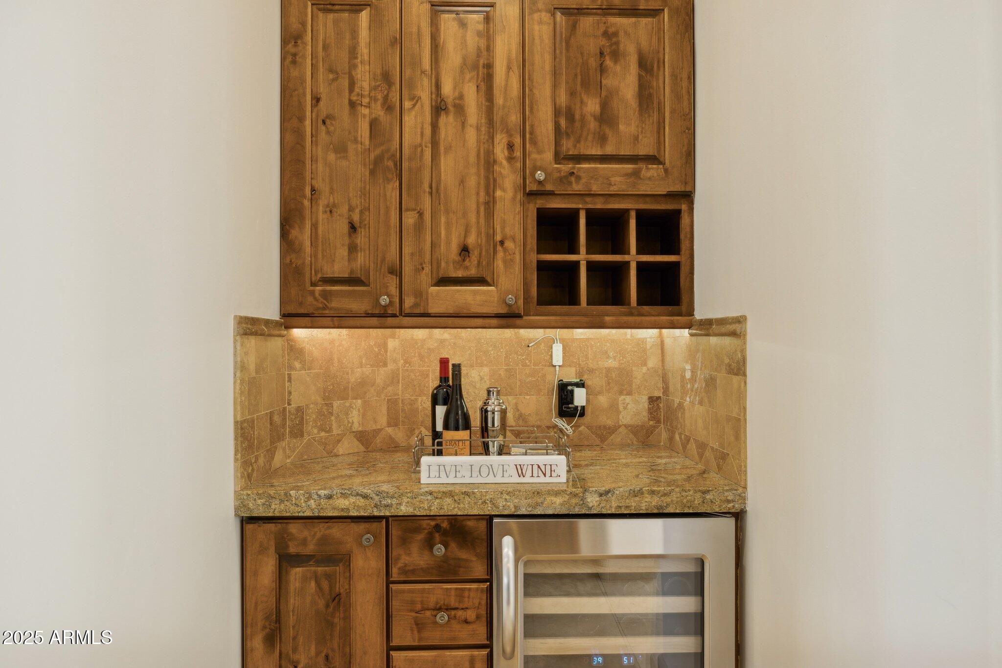13174 East Geronimo Road Scottsdale, AZ 85259 - Photo 14 of 60 a bathroom with a granite countertop sink and a window