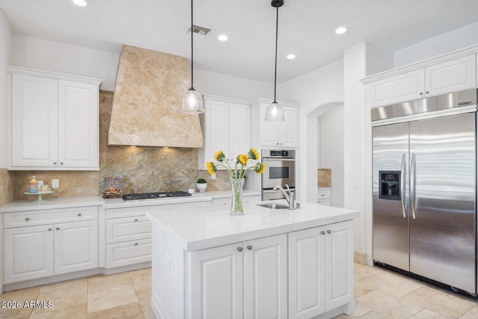 13174 East Geronimo Road Scottsdale, AZ 85259 - Photo 2 of 60 a kitchen with white cabinets sink and stainless steel appliances