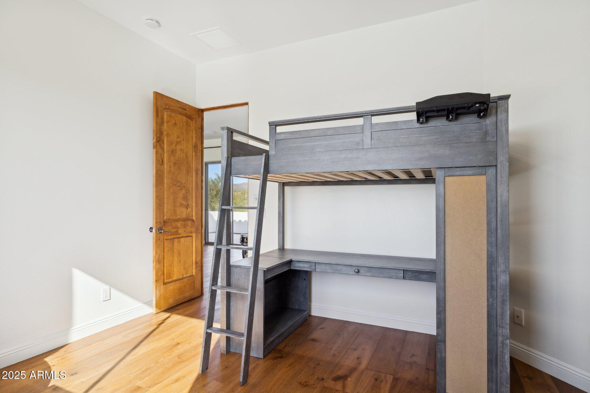 13174 East Geronimo Road Scottsdale, AZ 85259 - Photo 41 of 60 a view of walk in closet with empty racks