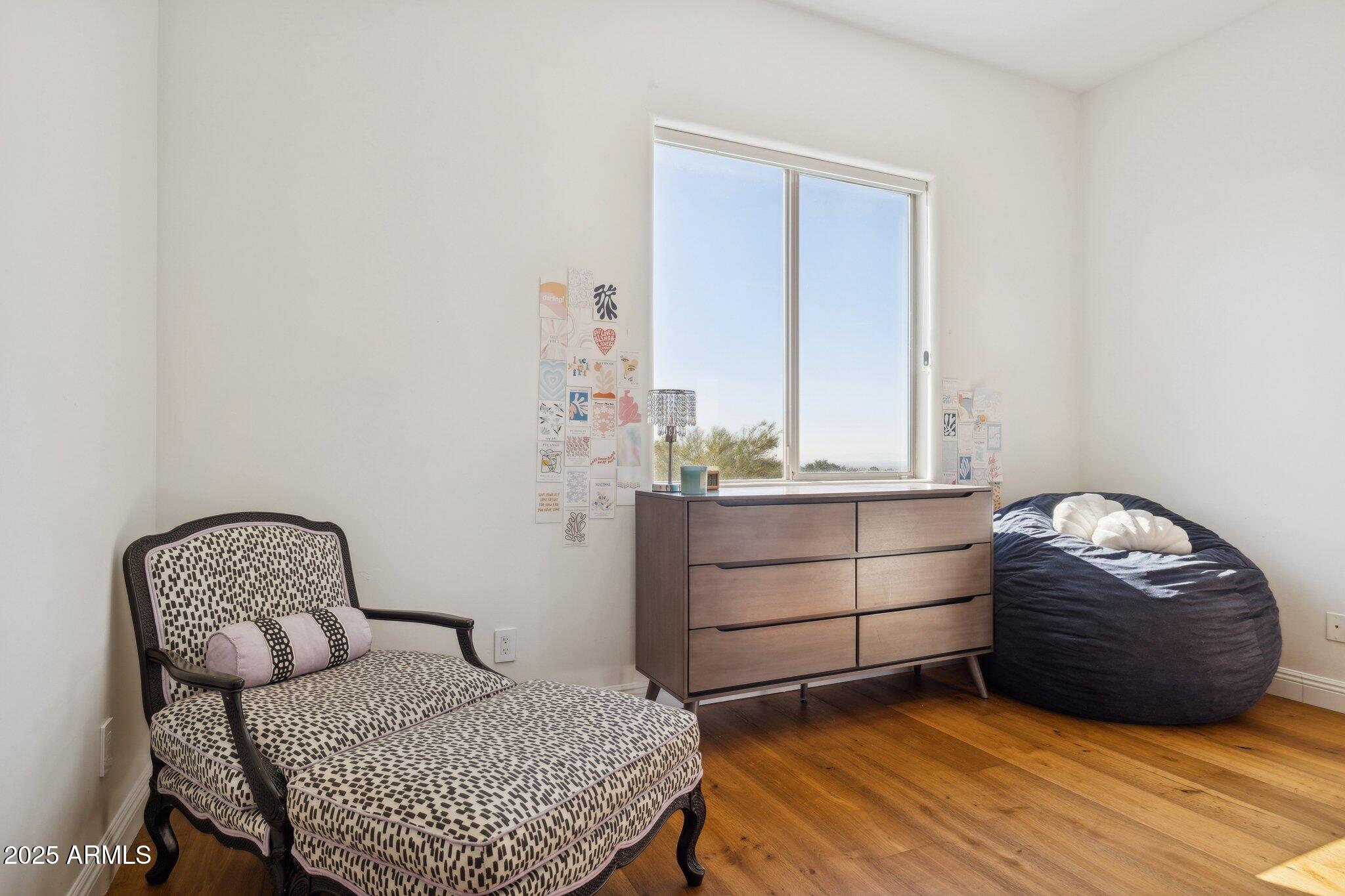 13174 East Geronimo Road Scottsdale, AZ 85259 - Photo 42 of 60 a room with a couch and a window