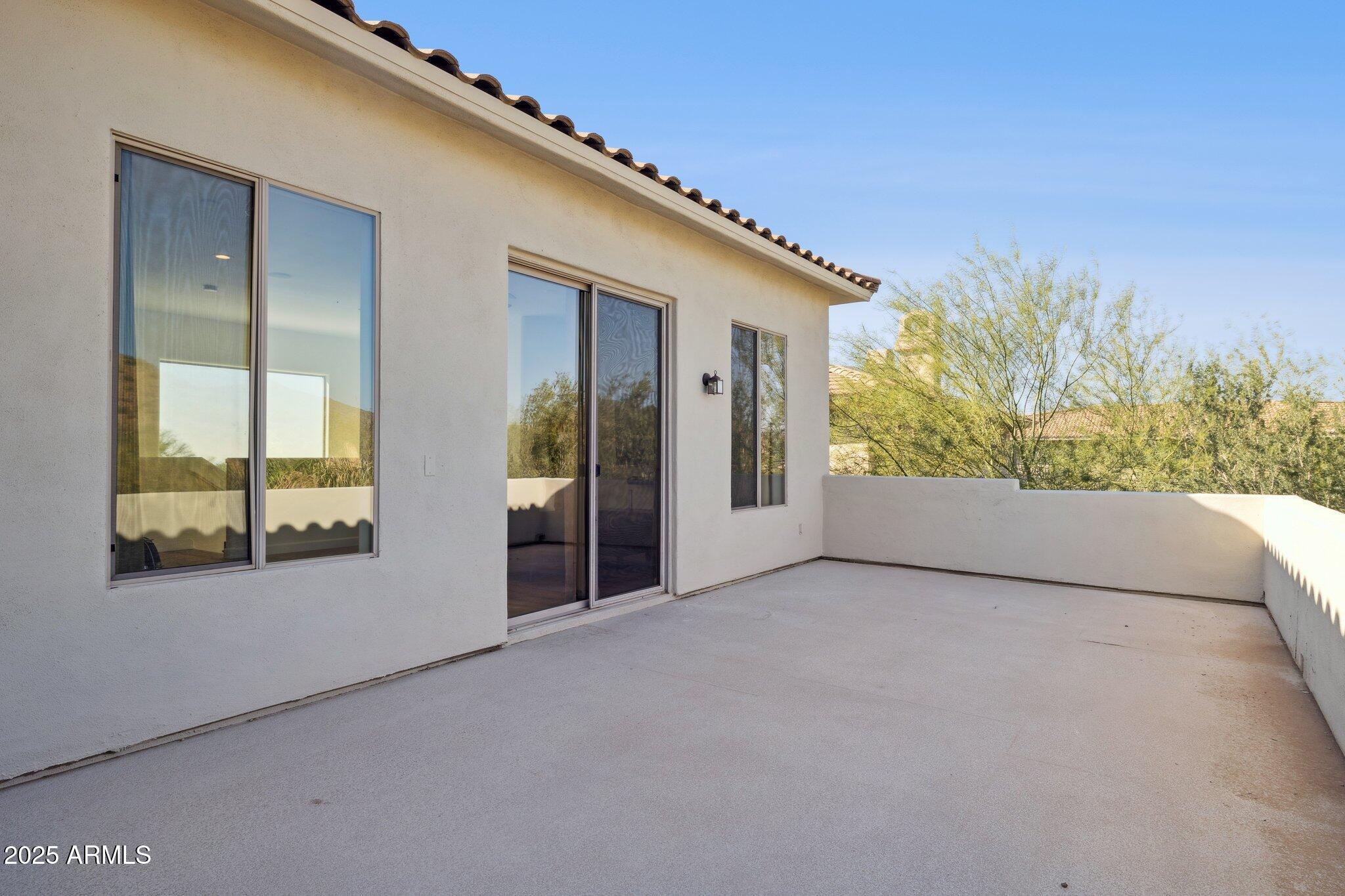 13174 East Geronimo Road Scottsdale, AZ 85259 - Photo 46 of 60 a view of a big room with windows and chandelier
