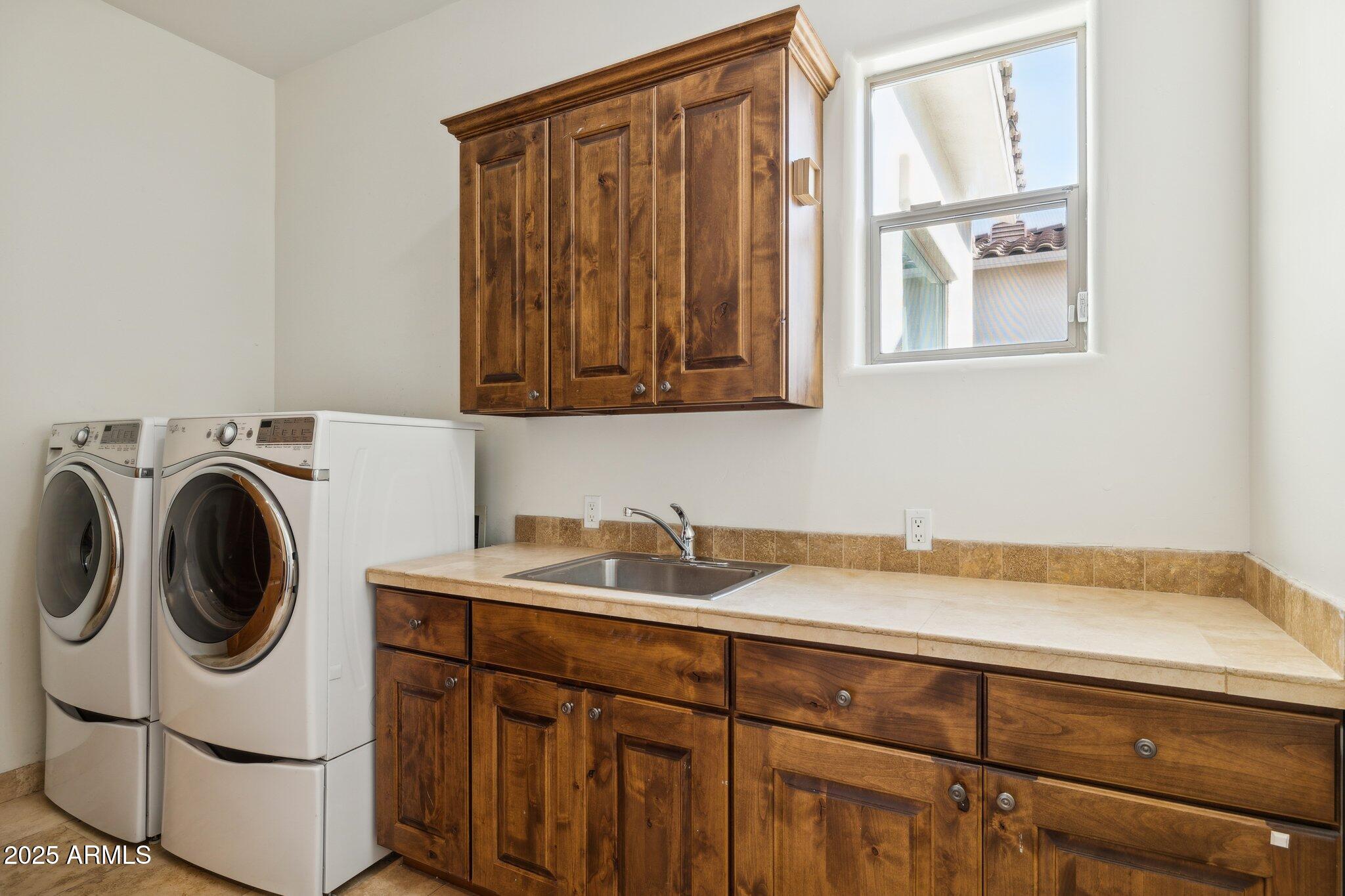13174 East Geronimo Road Scottsdale, AZ 85259 - Photo 47 of 60 a utility room with sink dryer and washer