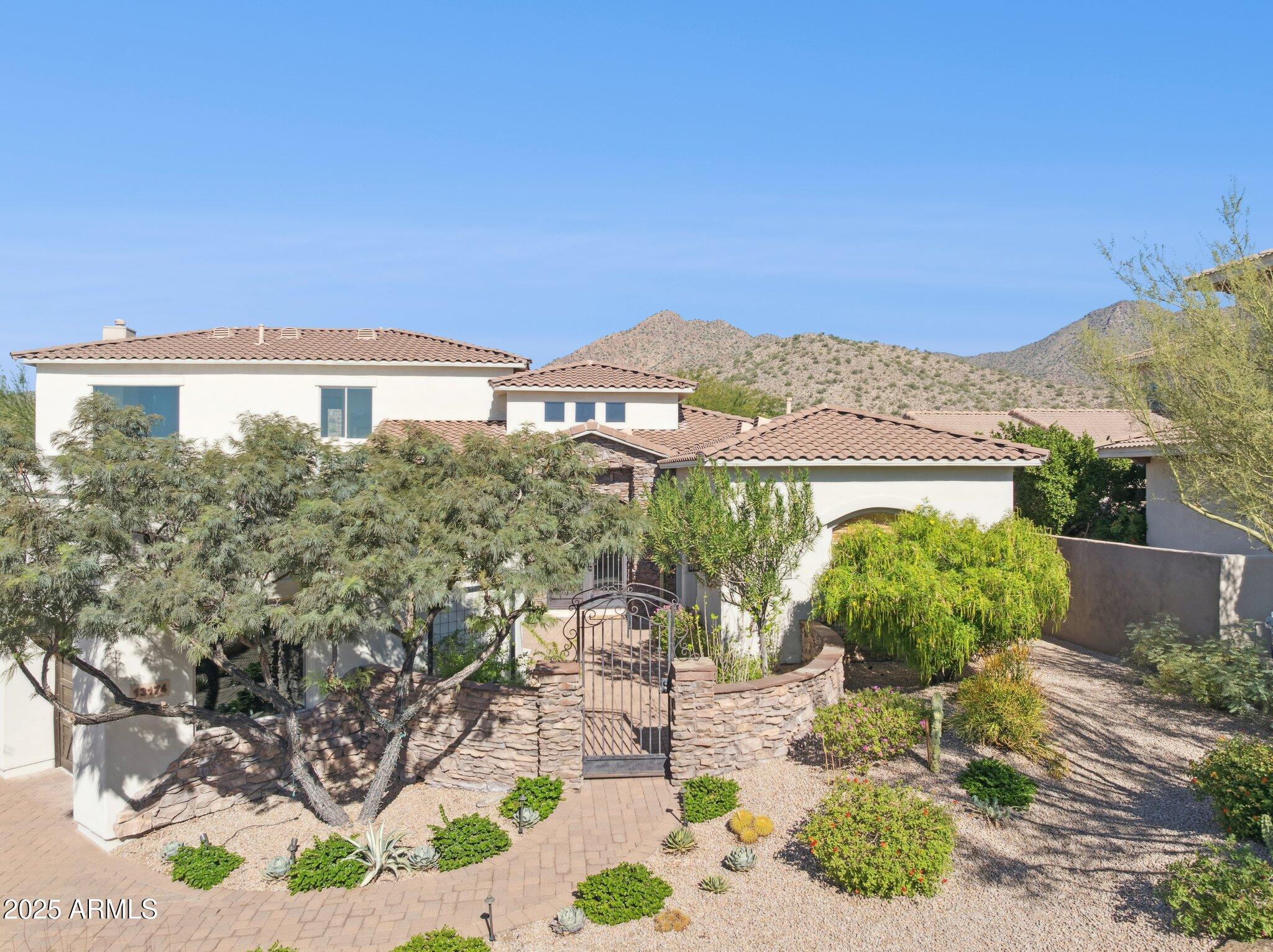13174 East Geronimo Road Scottsdale, AZ 85259 - Photo 58 of 60 a view of a patio with furniture and a yard