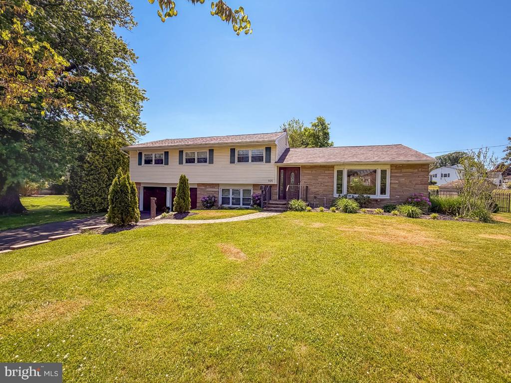 925 Big Oak Road Yardley, PA 19067 - Photo 5 of 51 a front view of a house with swimming pool