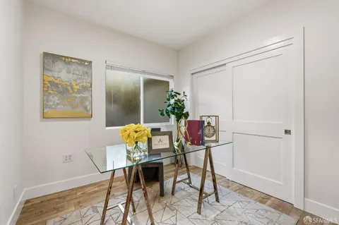 a workspace with furniture and lamp