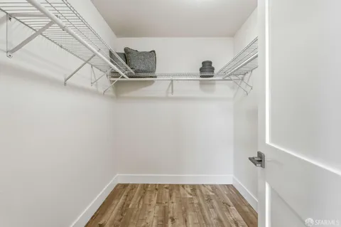 a view of a room with racks on the wall